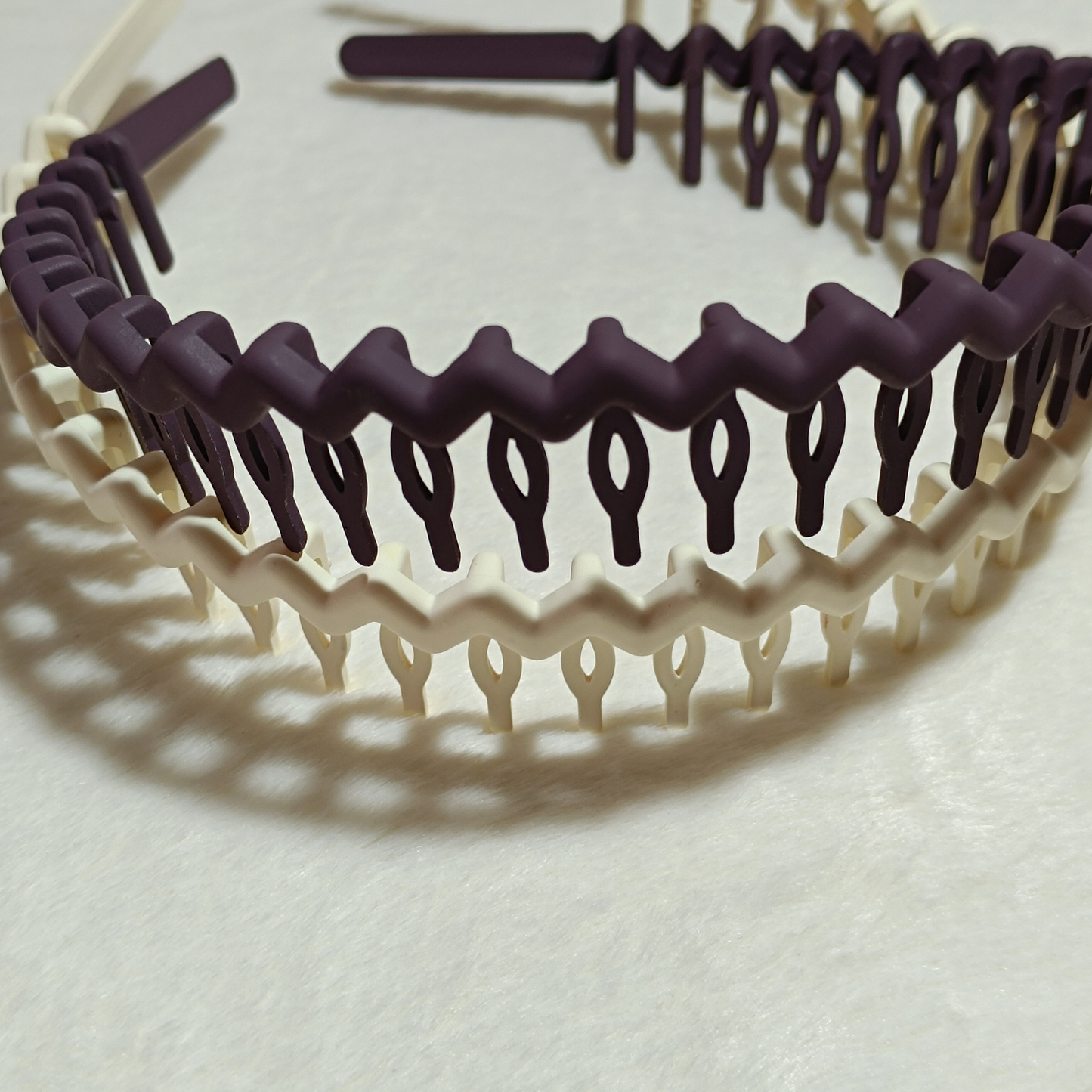 Serres-tête ondulés avec griffes